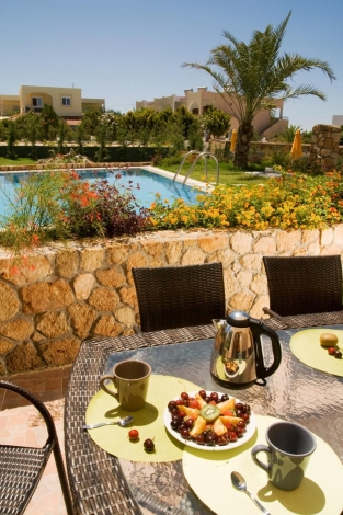 Villas in Pefkos, having breakfast by the pool, Image 14