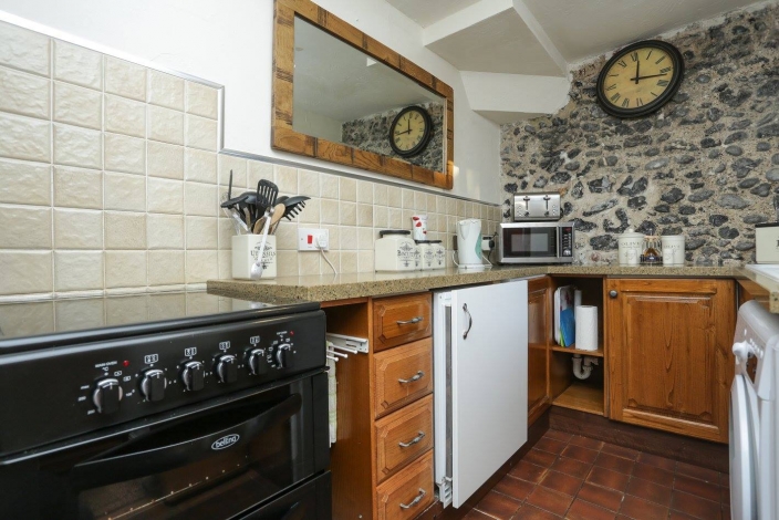 Annie's Cottage, Kitchen with character flint walls, Image 10