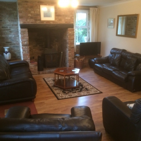 The Old School House, Lounge with leather sofas seats 12, Image 3