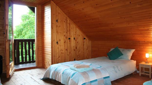 Cosy Alpine Chalet, Family bedroom, with 4 single beds and balcon, Image 9